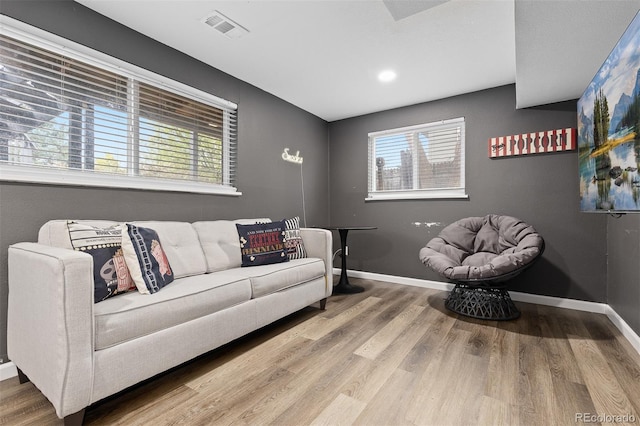 8506 Eaton St, Arvada, CO 80003 - living area featuring wood finished floors and baseboards