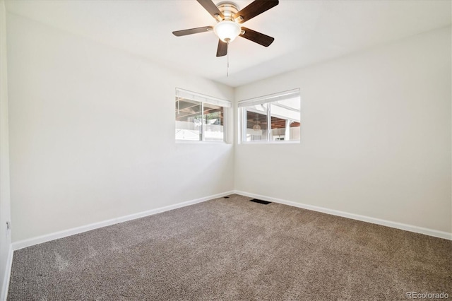 4500 Zephyr St, Wheat Ridge, CO 80033 - carpeted empty room featuring baseboards and ceiling fan
