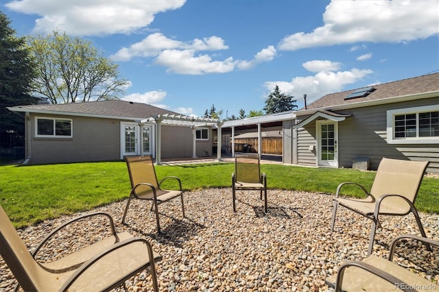 4500 Zephyr St, Wheat Ridge, CO 80033 - rear view of property with a pergola and a patio