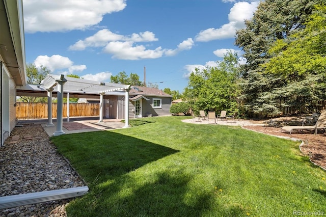 4500 Zephyr St, Wheat Ridge, CO 80033 - view of yard featuring a patio area, an outbuilding, and a pergola