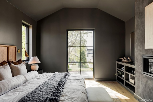 1680 S Humboldt St, Denver, CO 80210 - bedroom with wood finished floors and lofted ceiling