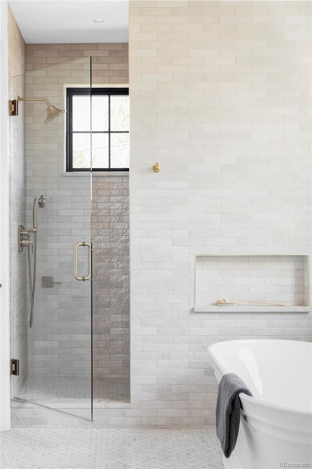 1680 S Humboldt St, Denver, CO 80210 - full bathroom featuring a stall shower and a freestanding bath
