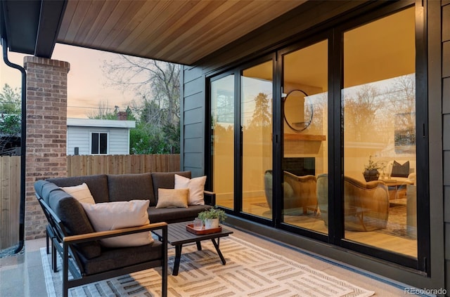 1680 S Humboldt St, Denver, CO 80210 - patio terrace at dusk featuring fence and an outdoor hangout area