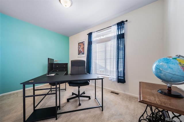 home office featuring light colored carpet