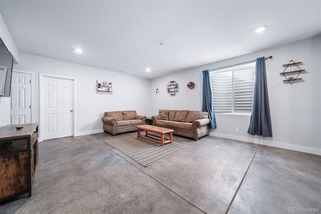 living room with concrete flooring