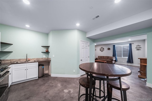 dining room featuring wet bar