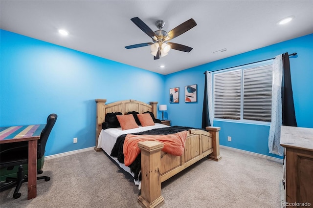 bedroom featuring light carpet and ceiling fan