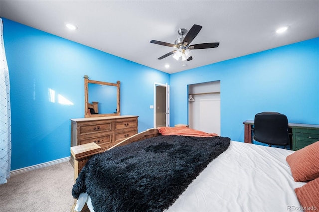 carpeted bedroom with ceiling fan