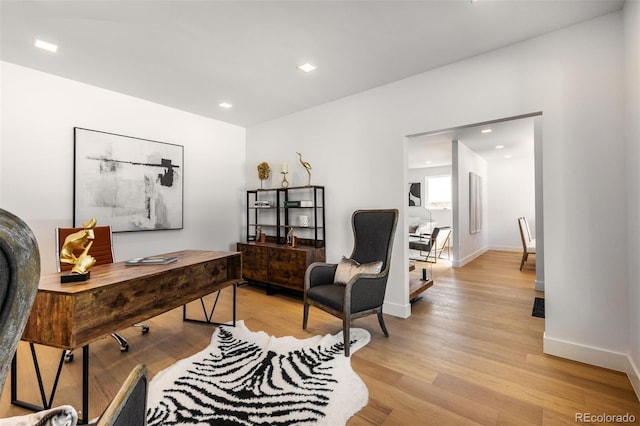 home office featuring light hardwood / wood-style floors