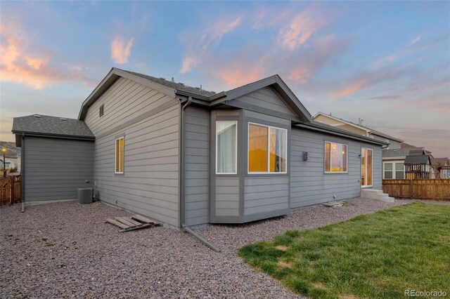 6514 Agave Ave, Castle Rock, CO 80108 - exterior space featuring a yard, central AC unit, and fence