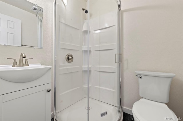 871 S Worchester St, Aurora, CO 80012 - bathroom featuring a shower stall, vanity, and a textured wall