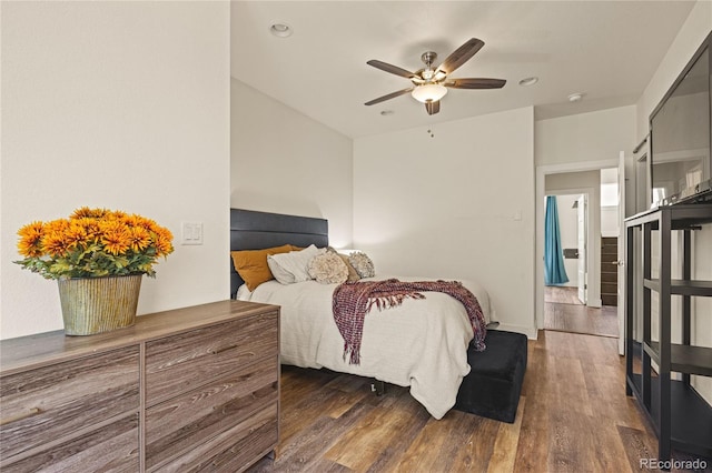 bedroom with a ceiling fan and wood finished floors