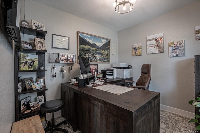 office featuring a textured ceiling