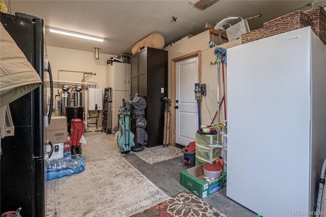 garage with white refrigerator and black fridge