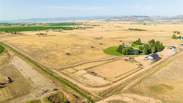 birds eye view of property with a rural view and a mountain view