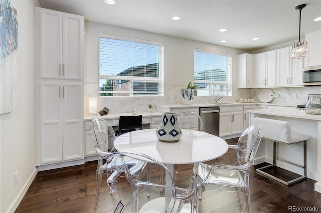 9180 E 52nd Dr, Denver, CO 80238 - dining area with dark wood-type flooring and recessed lighting