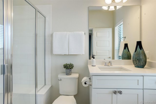 9180 E 52nd Dr, Denver, CO 80238 - bathroom featuring vanity, a shower stall, and a ceiling fan