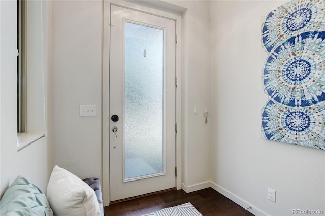 9180 E 52nd Dr, Denver, CO 80238 - entrance foyer featuring dark wood-style flooring and baseboards