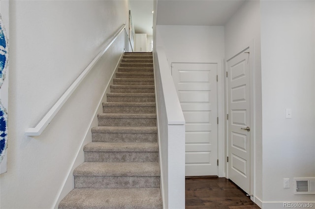 9180 E 52nd Dr, Denver, CO 80238 - staircase with wood finished floors