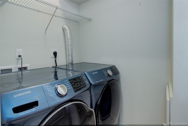 9180 E 52nd Dr, Denver, CO 80238 - washroom featuring washing machine and clothes dryer