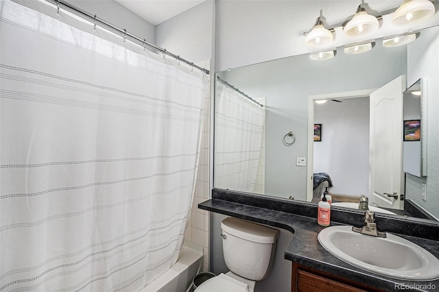 full bathroom with vanity, toilet, and shower / bath combo with shower curtain