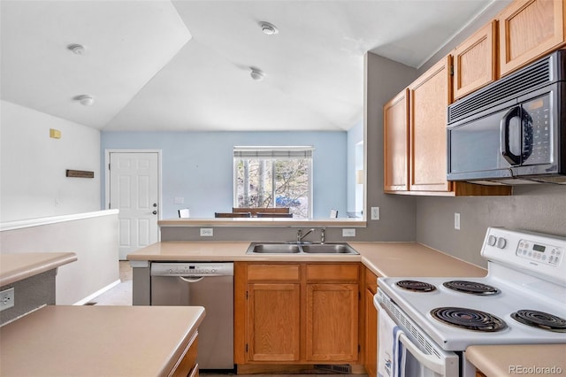 10 River Park Dr Unit A, Breckenridge, CO 80424 - kitchen with electric range, stainless steel dishwasher, black microwave, a sink, and a peninsula