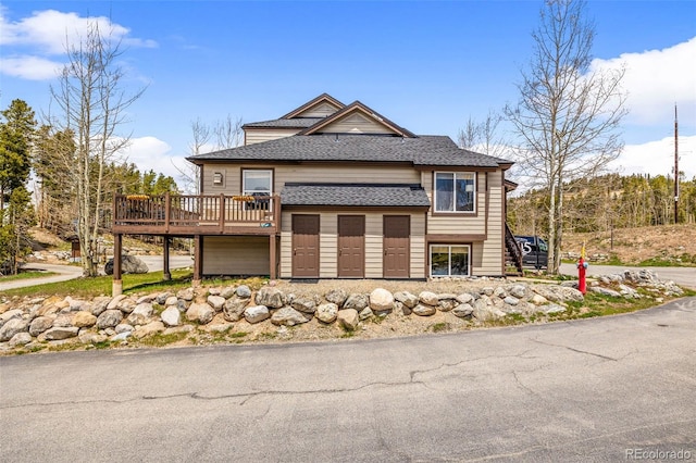 10 River Park Dr Unit A, Breckenridge, CO 80424 - view of front of property featuring a deck and roof with shingles