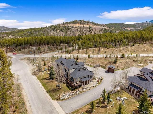 10 River Park Dr Unit A, Breckenridge, CO 80424 - aerial view of property and surrounding area featuring a forest and a mountain backdrop