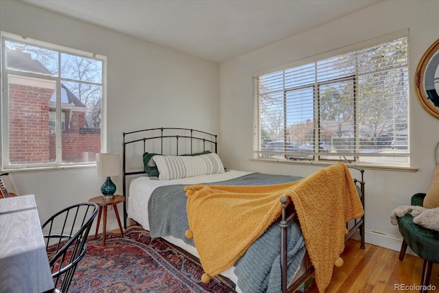 bedroom featuring hardwood / wood-style floors