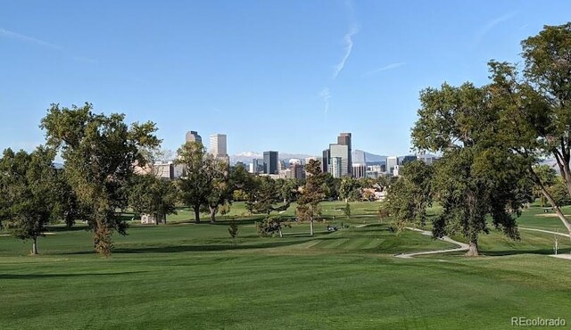 surrounding community featuring a yard