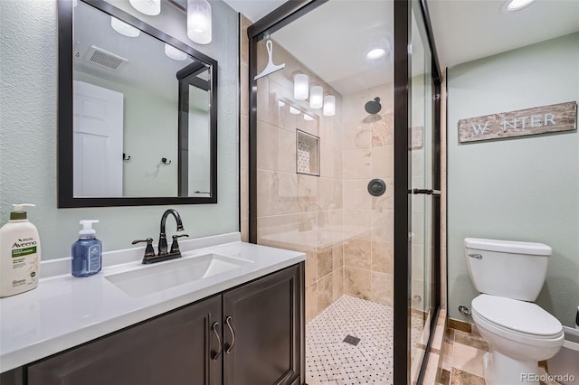 455 Bexley St, Littleton, CO 80126 - full bath featuring a stall shower, vanity, and recessed lighting