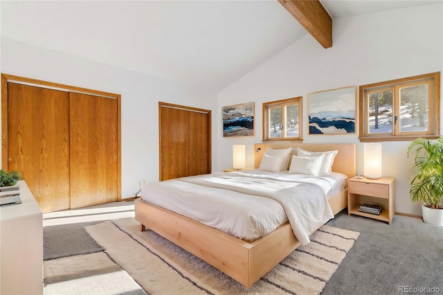 bedroom with beam ceiling, light colored carpet, and high vaulted ceiling