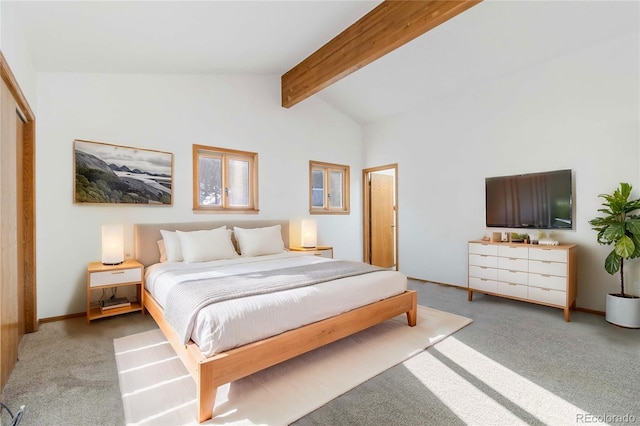 bedroom with light carpet, lofted ceiling with beams, and a closet