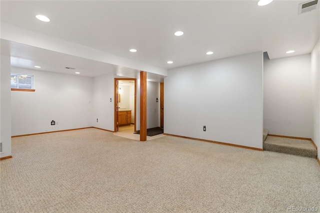 basement with light colored carpet