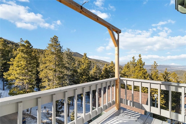 balcony featuring a mountain view