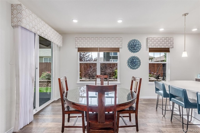16321 Clayton St, Thornton, CO 80602 - dining space featuring wood finished floors, plenty of natural light, and recessed lighting