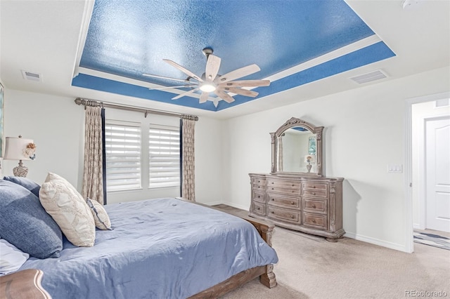 16321 Clayton St, Thornton, CO 80602 - carpeted bedroom with a tray ceiling and ceiling fan