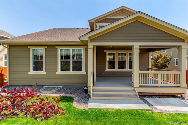 16321 Clayton St, Thornton, CO 80602 - view of front of property with covered porch and a shingled roof