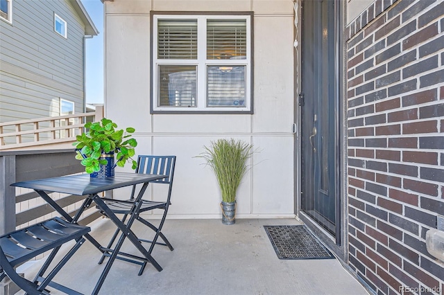 doorway to property featuring a patio area