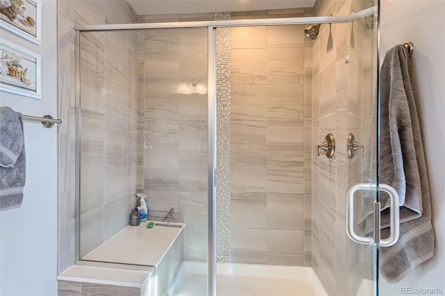 bathroom featuring an enclosed shower