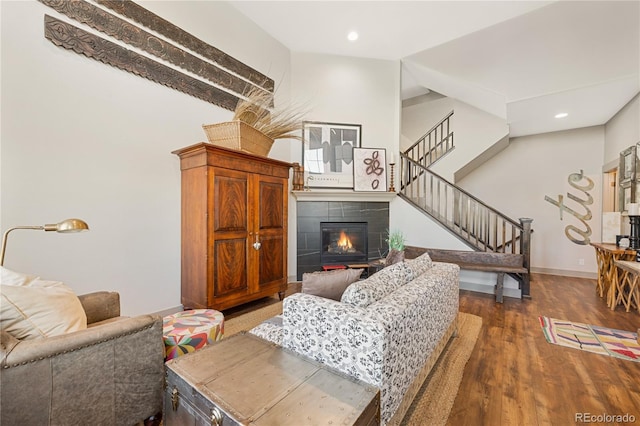 8872 E 47th Ave, Denver, CO 80238 - living area with stairs, wood finished floors, a fireplace, and recessed lighting