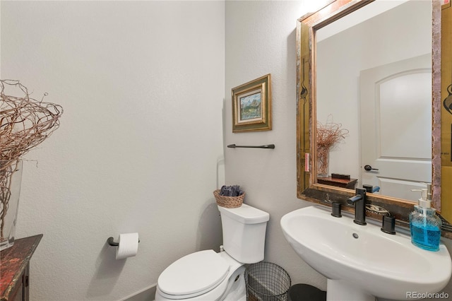 8872 E 47th Ave, Denver, CO 80238 - bathroom featuring a sink and toilet