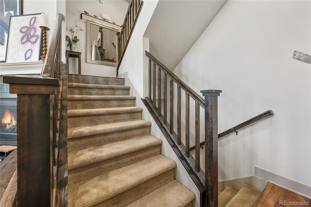 8872 E 47th Ave, Denver, CO 80238 - staircase with wood finished floors and baseboards
