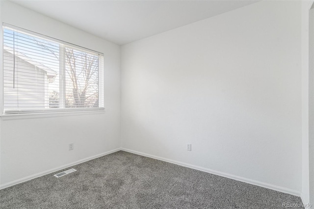 view of carpeted spare room