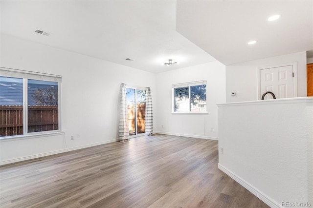 empty room with light wood-type flooring