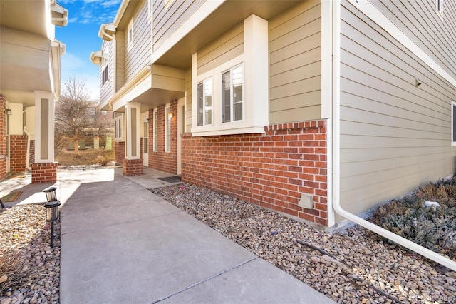 view of property exterior featuring a patio