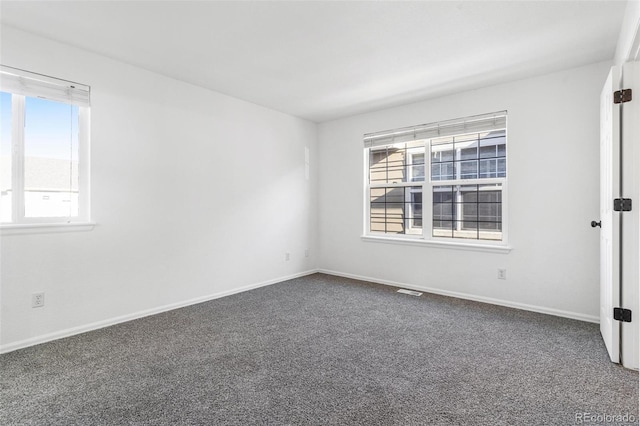 view of carpeted spare room