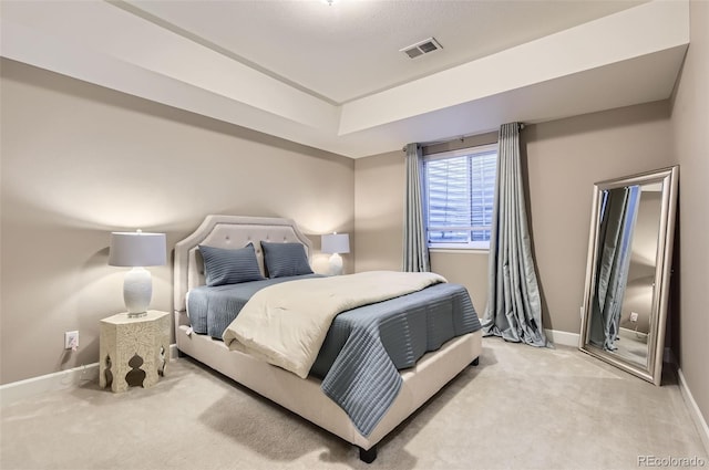 carpeted bedroom with baseboards