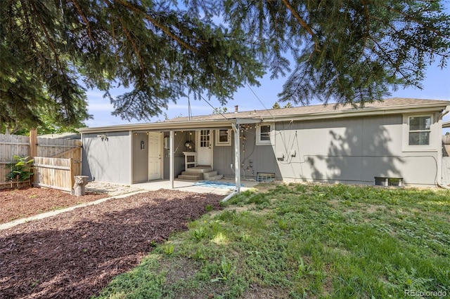 7350 Dale Ct, Westminster, CO 80030 - rear view of property featuring entry steps