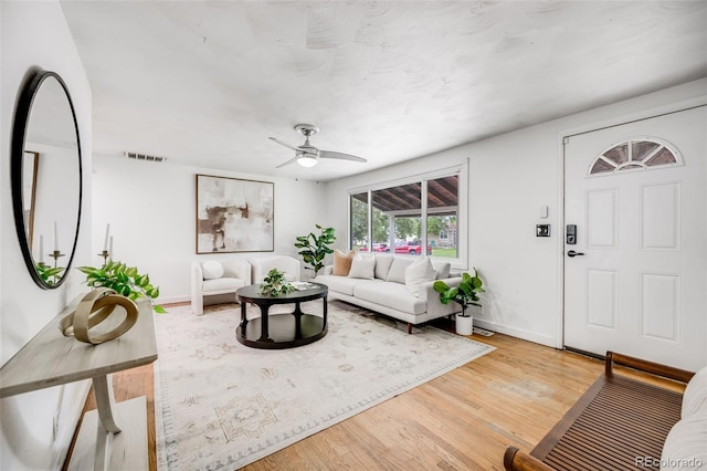7350 Dale Ct, Westminster, CO 80030 - living room featuring light wood finished floors and ceiling fan